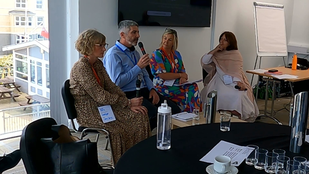 picture of the panel from left to right Efa Gruffudd Jones, Welsh Language Commissioner, Derek Walker, Future Generations Commissioner, Sian Morris Jones, Youth and Community Director of the Urdd and Einir Sion, Welsh Language Enabler for Arts Wales 