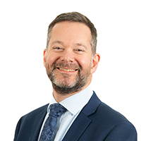 Headshot photograph of Kevin Thomas