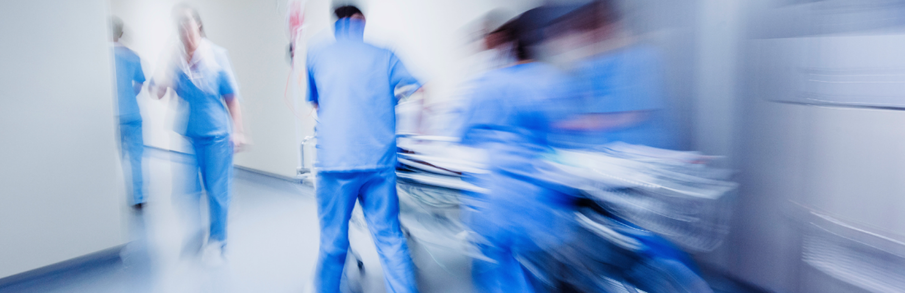 a picture of doctors in scrubs in and accident and emergency unit